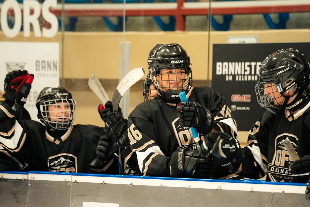 OFS players celebrating on the bench